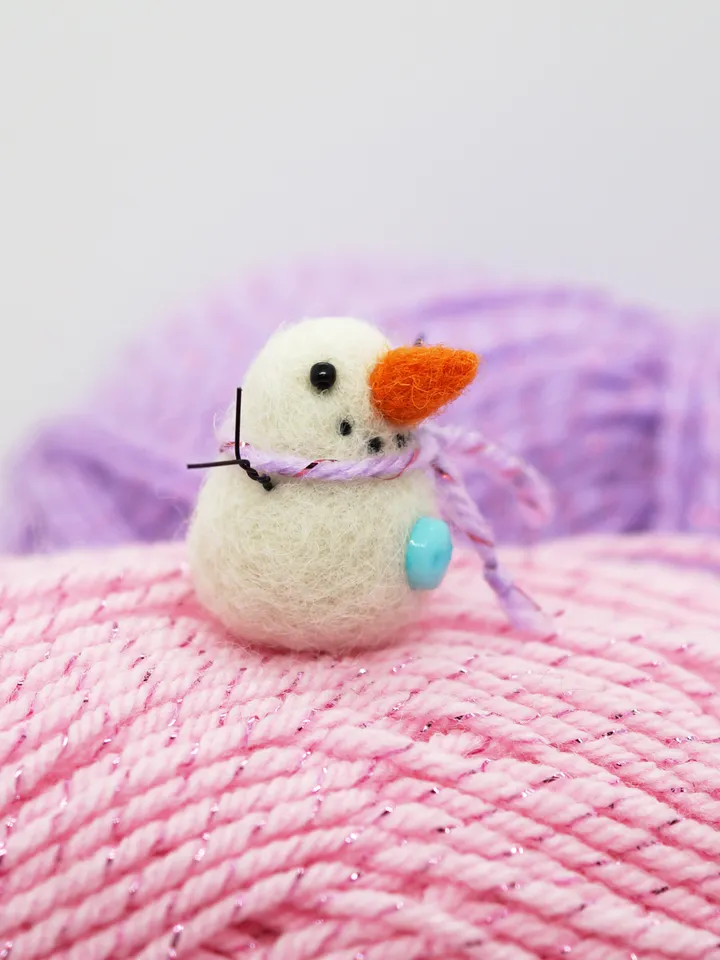 Tiny needle felted snowman, purple scarf