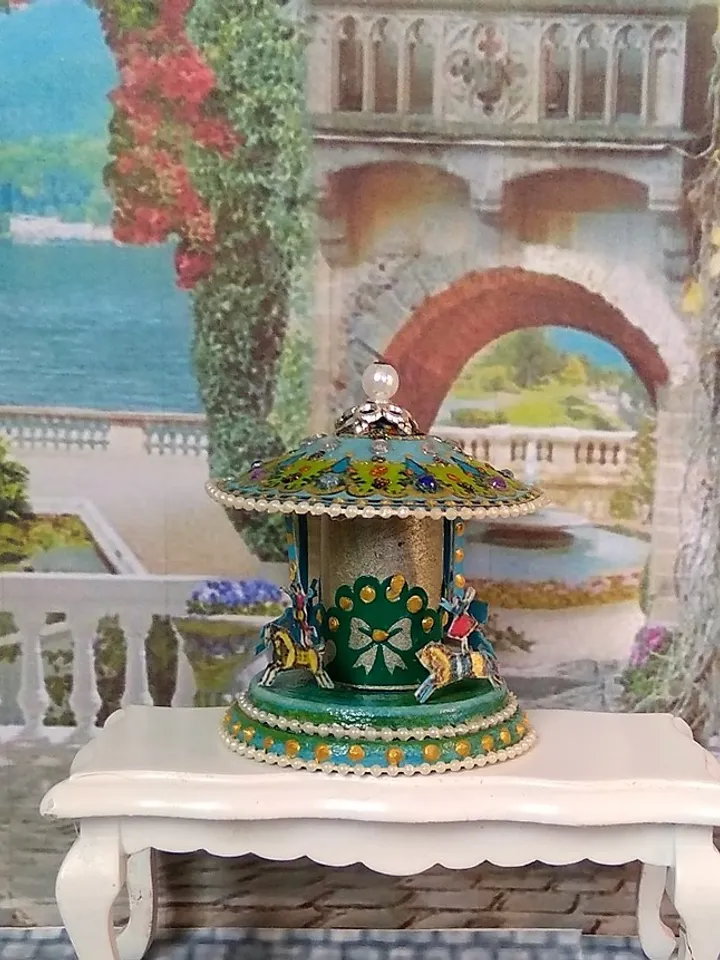 Miniature carousel. Dollhouse miniature.1:12 scale.