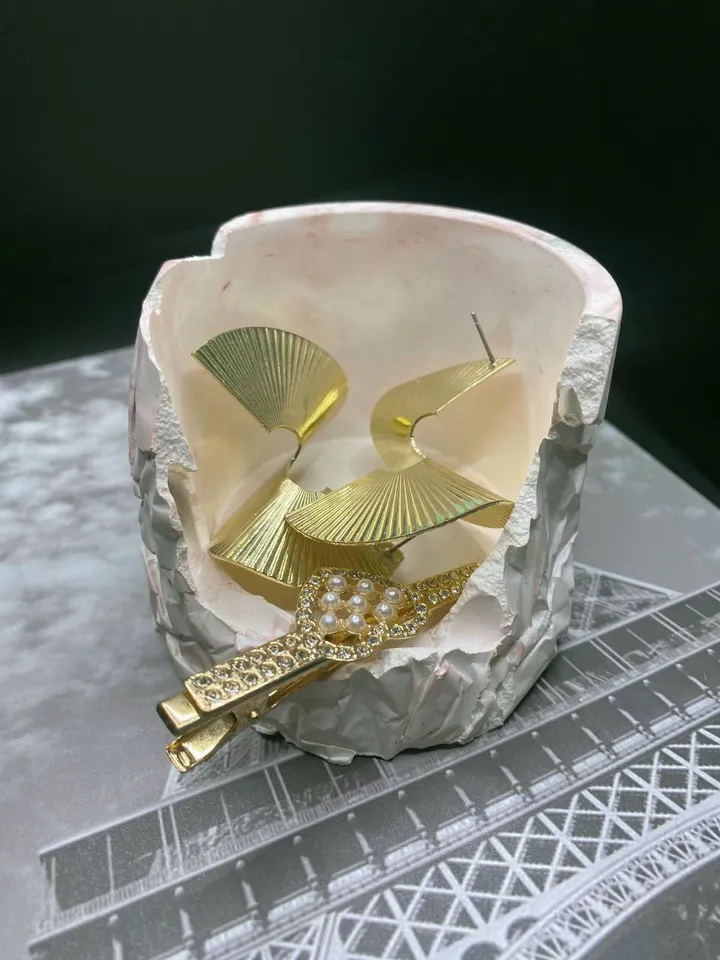 Candlestick or jewelry stand made of plaster