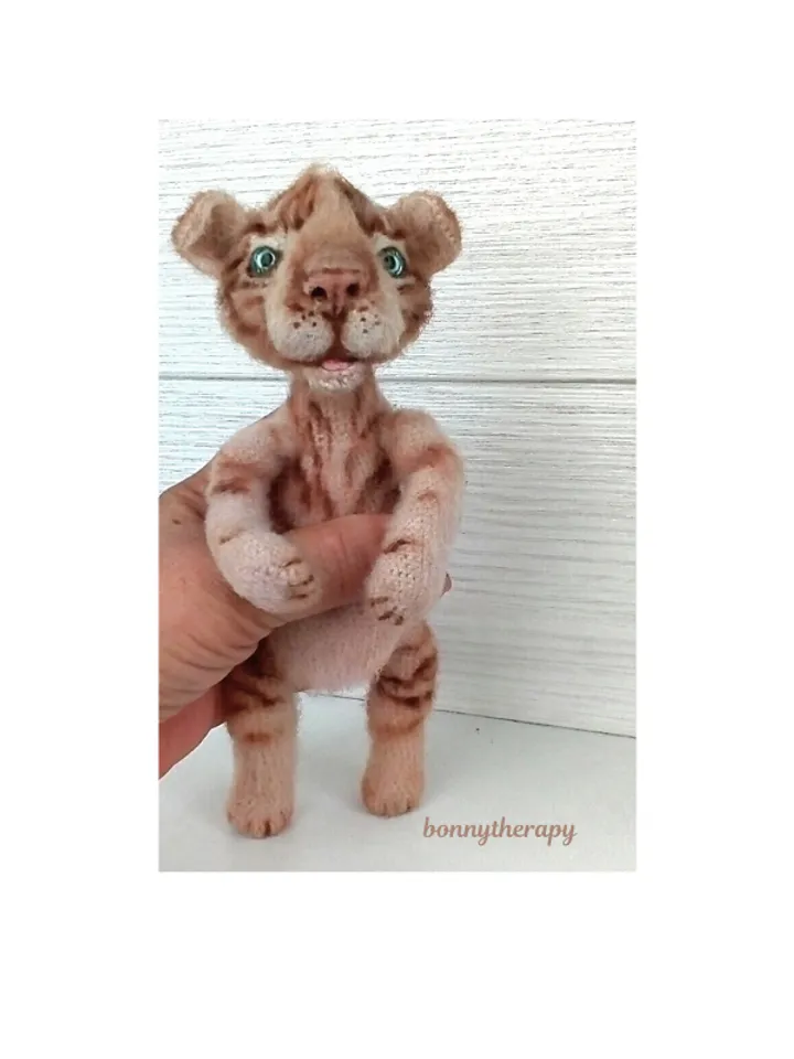 Cute crochet toy tiger cub, stuffed animal with wire frame