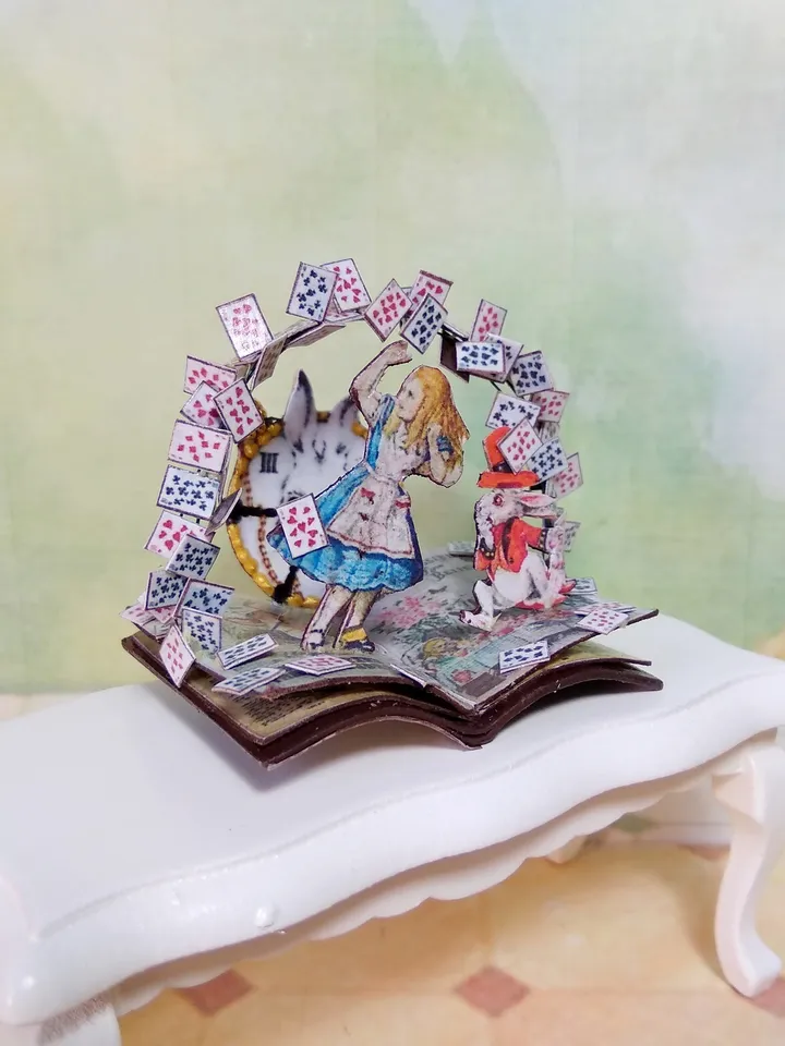 Open book. Dollhouse miniature.Miniature for a dollhouse.1:12 scale.
