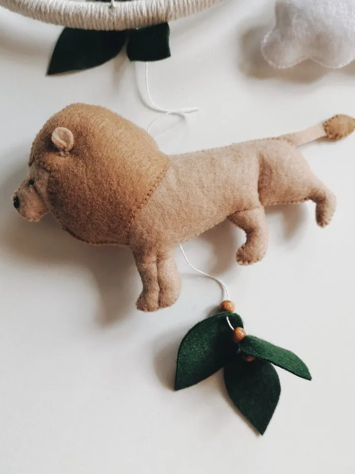 Safari mobile baby nursery decor crib