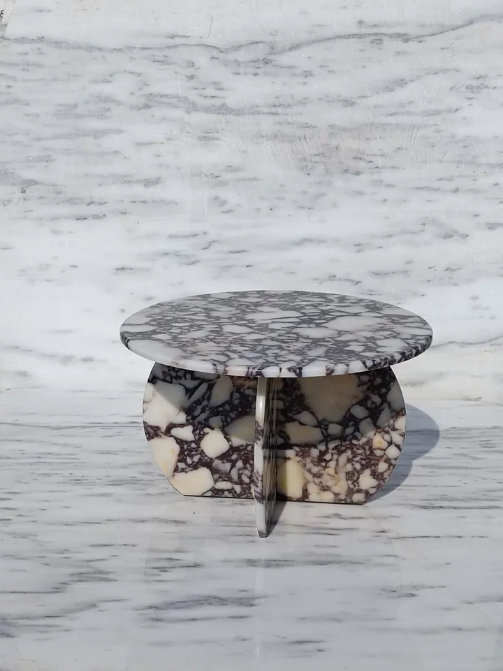 Calacatta Viola Coffee Table is Real Marble and everything is marble, including the Italian model handmade legs.