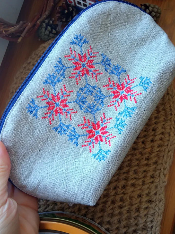 Cosmetic bag or pencil case made of linen with hand embroidery of a traditional Belarusian ornament