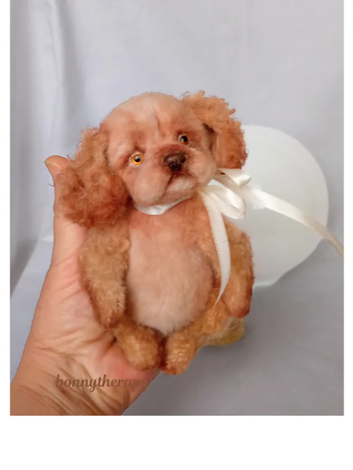 A cute puppy is waiting for you.