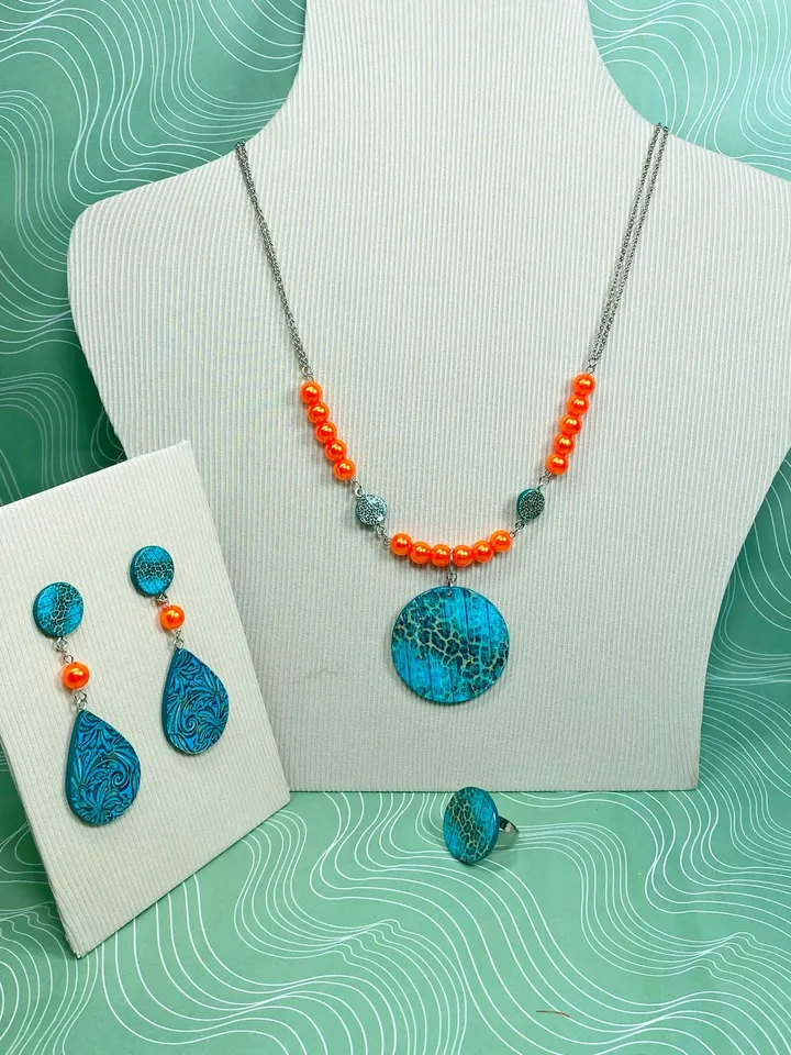 Bright set of handmade jewelry. Individual design.