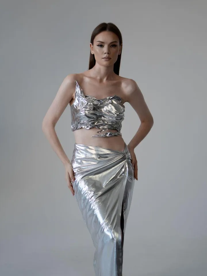 Chrome-plated armored top bando for women in a bikini