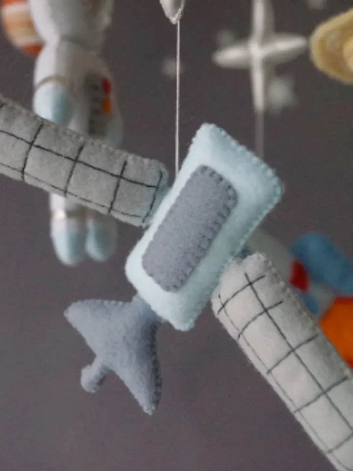 A space baby mobile. Spaceship and planets for boy's nursery decor,  outer space orbit handmade mobile