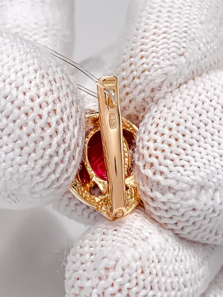 Earrings made of 925 silver (585 gold plated) with corundum and ruby