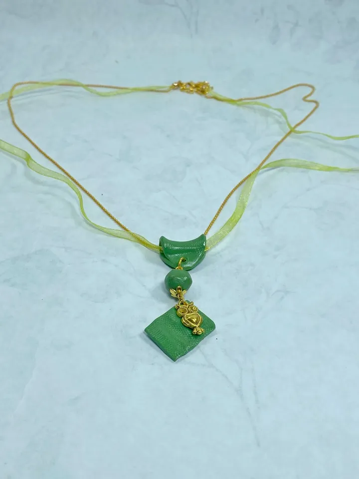 Handmade pendant on a chain. Handmade jewelry.