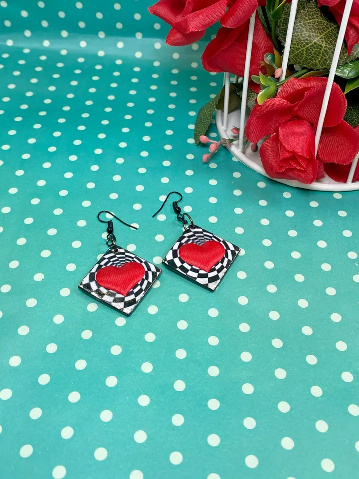 Bright handmade earrings. Handmade jewelry. Author's design. Earrings with bright hearts.