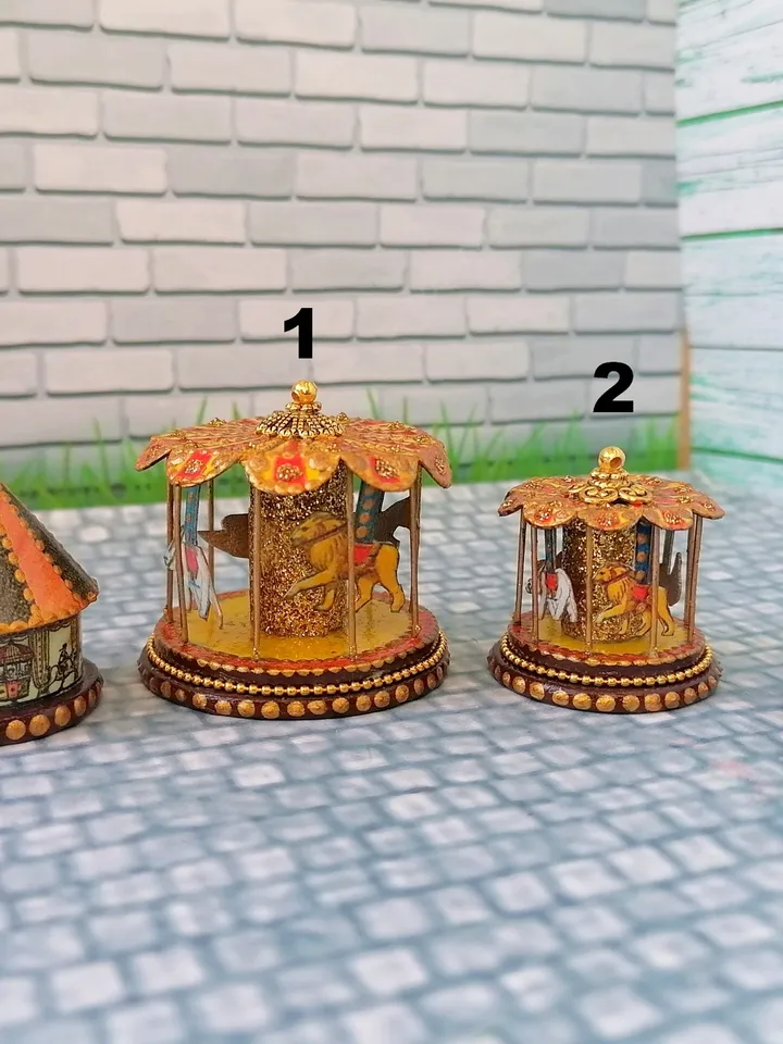 Miniature dollhouse carousel with gold trim. 1:12. Dollhouse miniature.