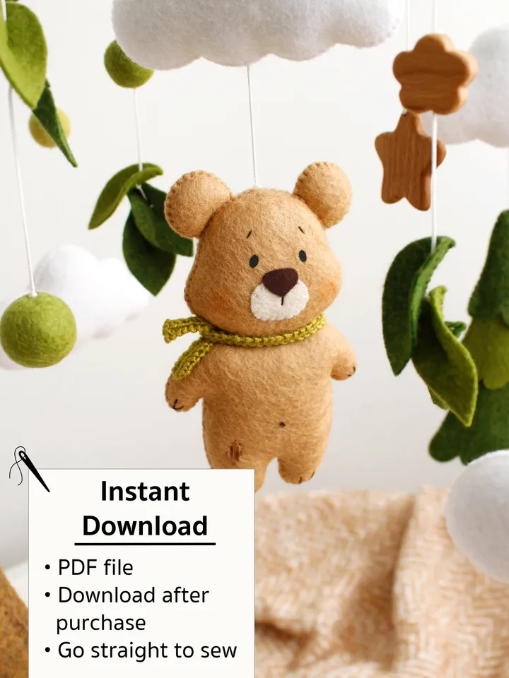 Felt woodland bear with clouds, spruce tree and mountain baby crib mobile hand sewing PDF tutorial with patterns. DIY forest nursery baby cot decoration