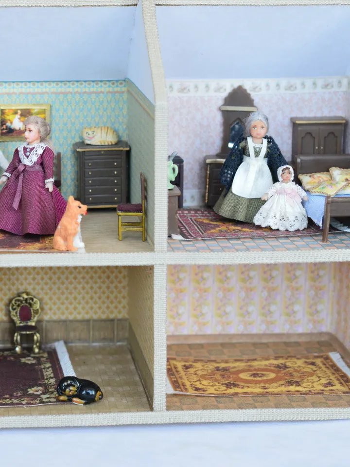 Miniature doll in the 48th scale. Grandmother for a dollhouse.