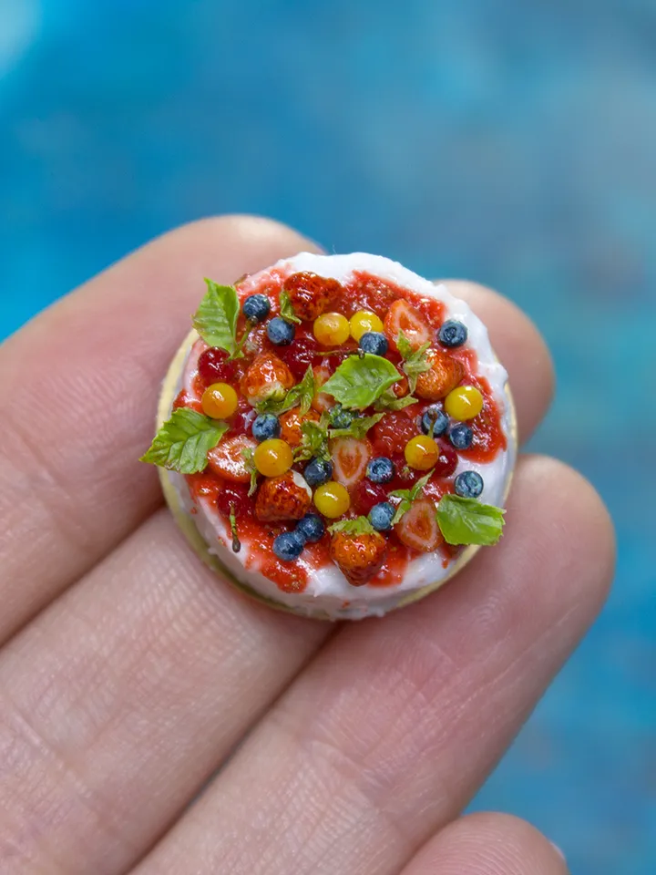 MINIATURE cake with berries on a gold cardboard stand  2