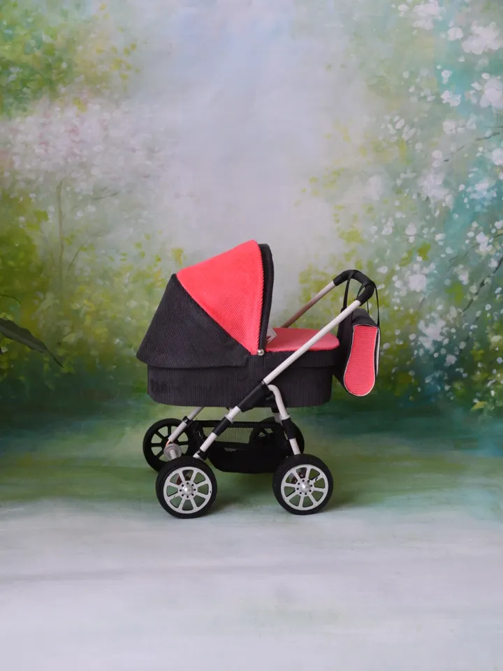 Miniature toy stroller for Barbie dolls.