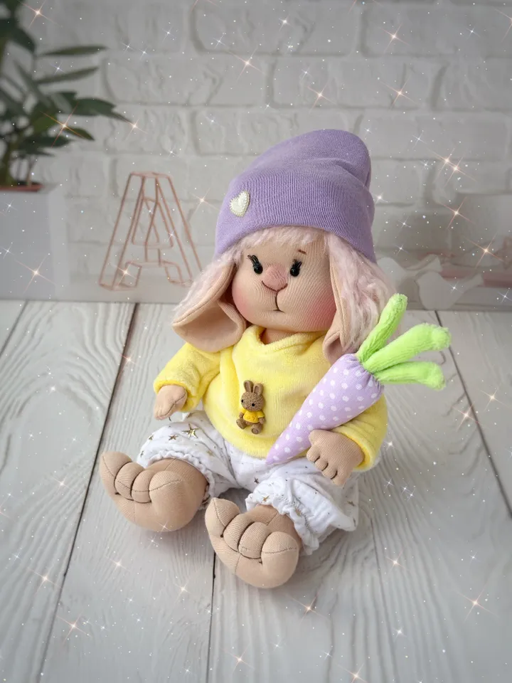 Lovey bunny toy. Handmade cute stuffed rabbit with clothes and carrot. Soft rag bunny doll for Easter gift.