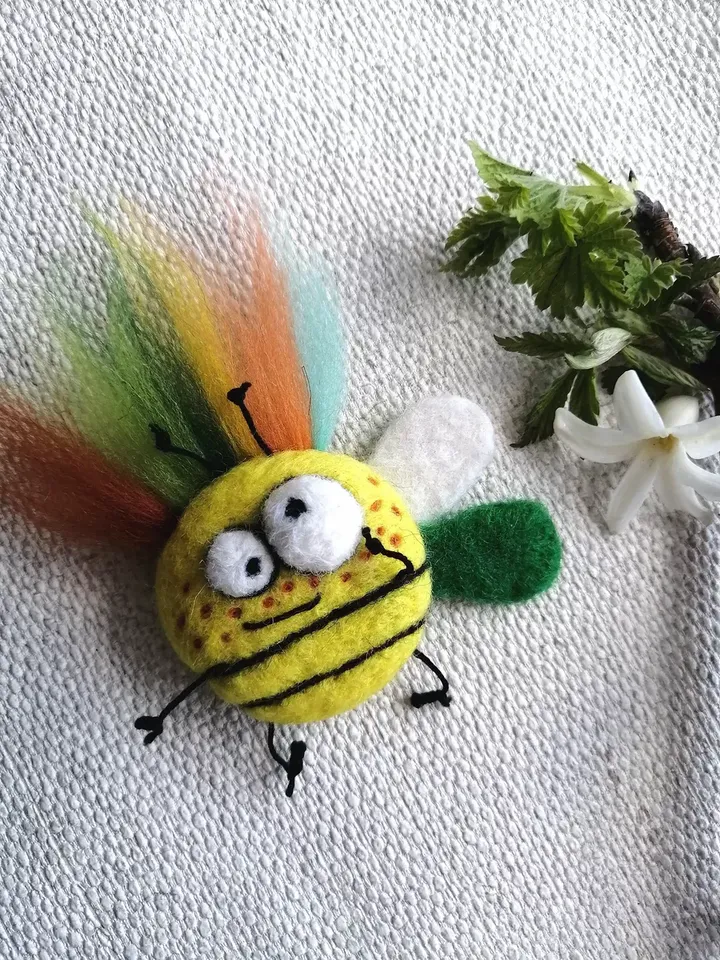 Women's original brooch in a handmade gift box. Sunny summer decoration for girls