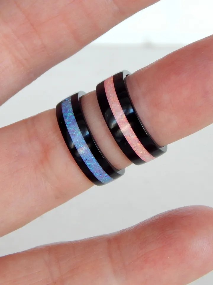 Stylish black ring. Carbon ring with synthetic opal. 5 3/4