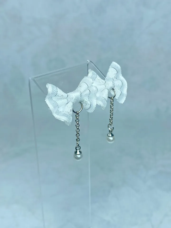 Handmade bow earrings. Author's work. Bright jewelry.