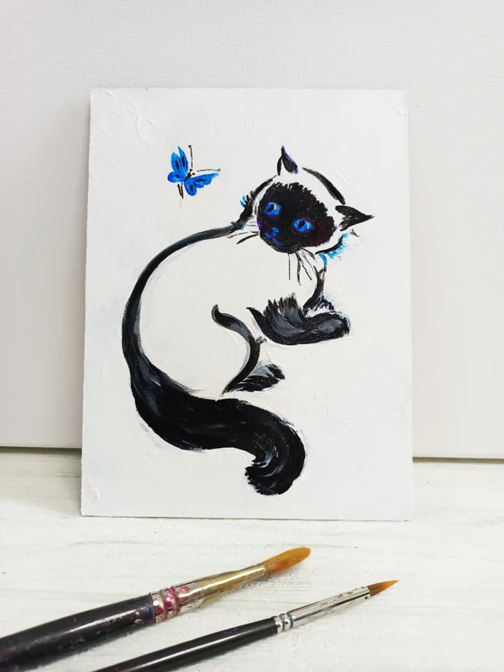 Painting with a kitten and a butterfly. Painting on cardboard 6" x 8". Acrylic. Author's painting.