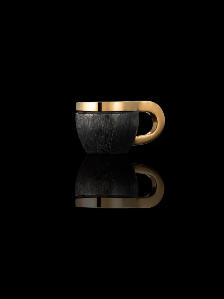 Pendant cup of coffee made of silver with gold plating.
