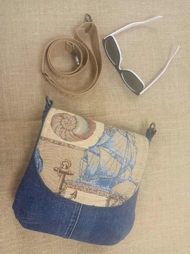 Cute crossbody denim bag, a women's messenger bag with a tapestry flap with a marine theme pattern and denim shoulder bag with 4 pockets inside and an adjustable strap.