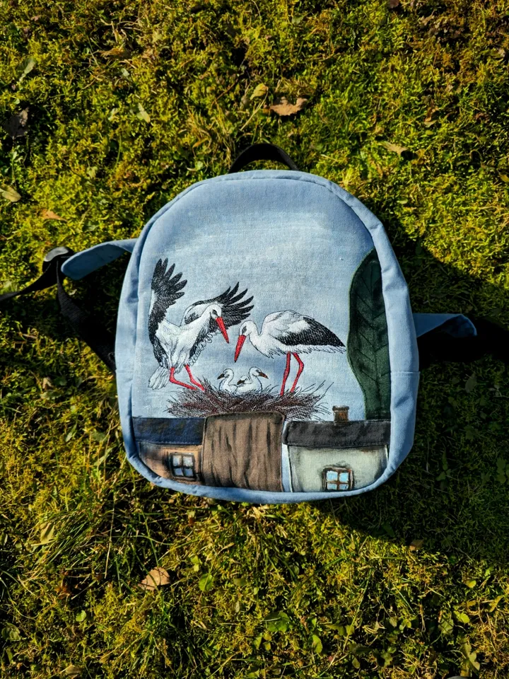 Storks embroidered backpack