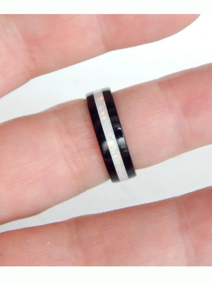Stylish black ring. Carbon ring with synthetic opal. 8