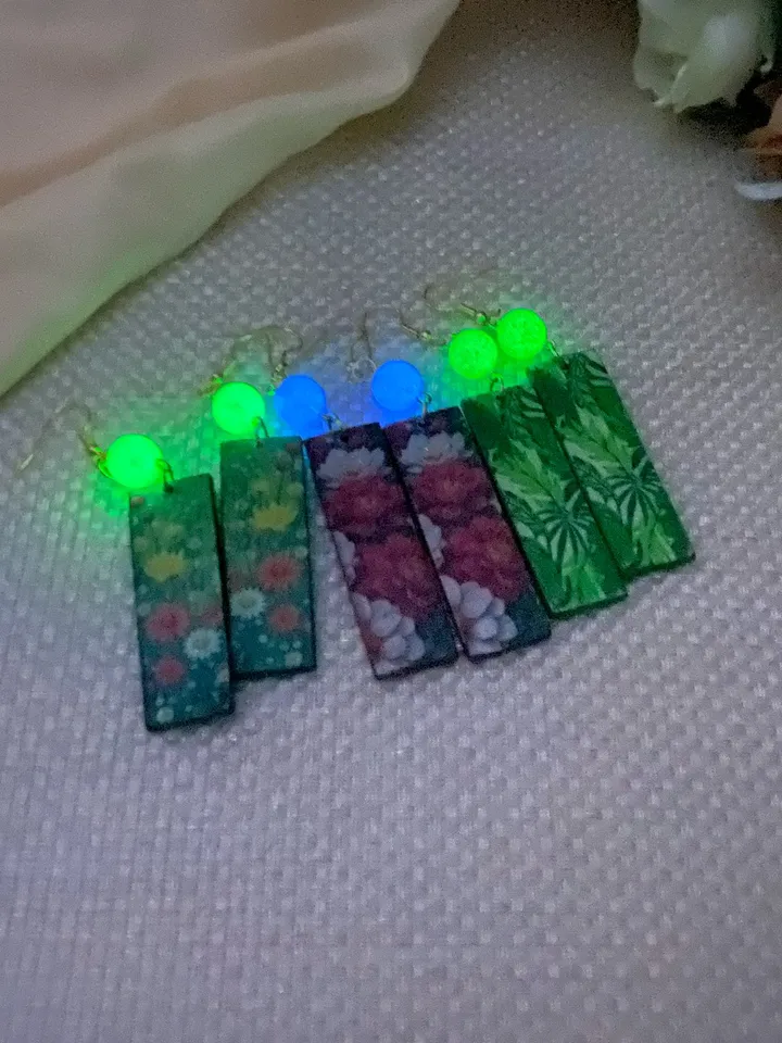 Earrings with luminous beads. Handmade jewelry.