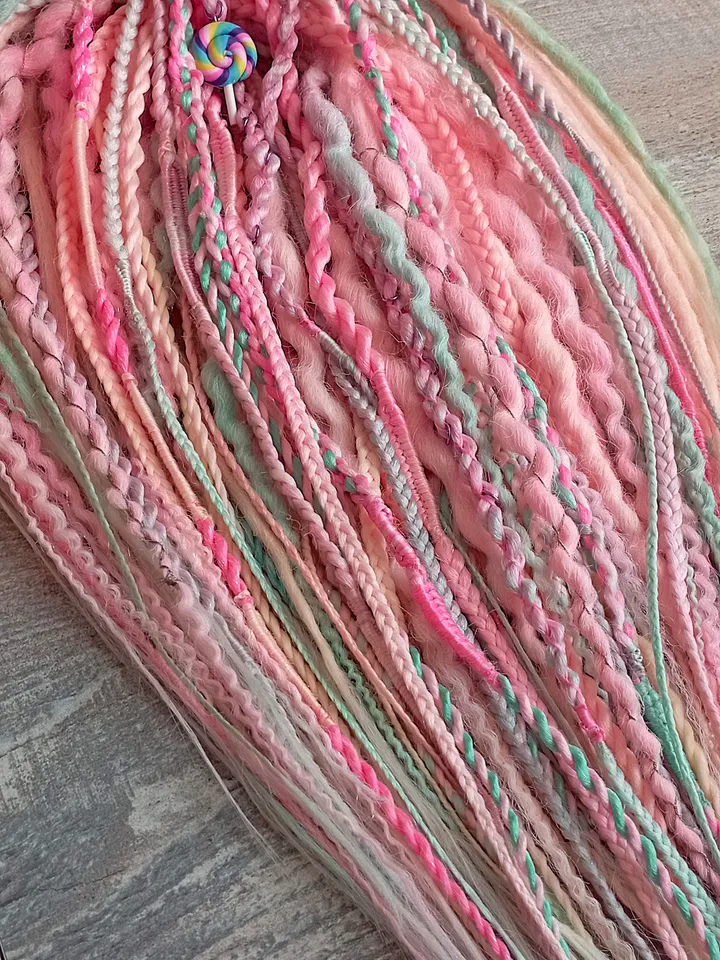 Pink De dreadlocks and braids