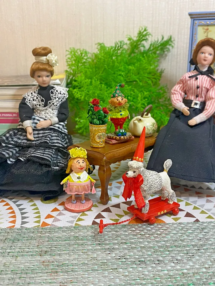 Poodle on a cart. Doll toy. Scale 1:12.