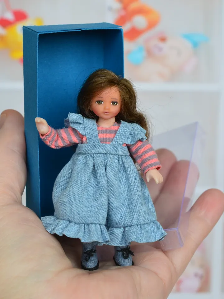 Miniature doll. Doll girl. Doll for a dollhouse.1 12 scale.