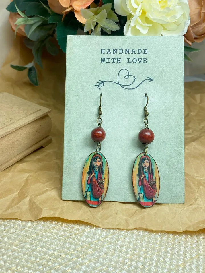Handmade earrings. Author's design. Jewelry.Earrings with a picture of a girl. Wooden earrings.