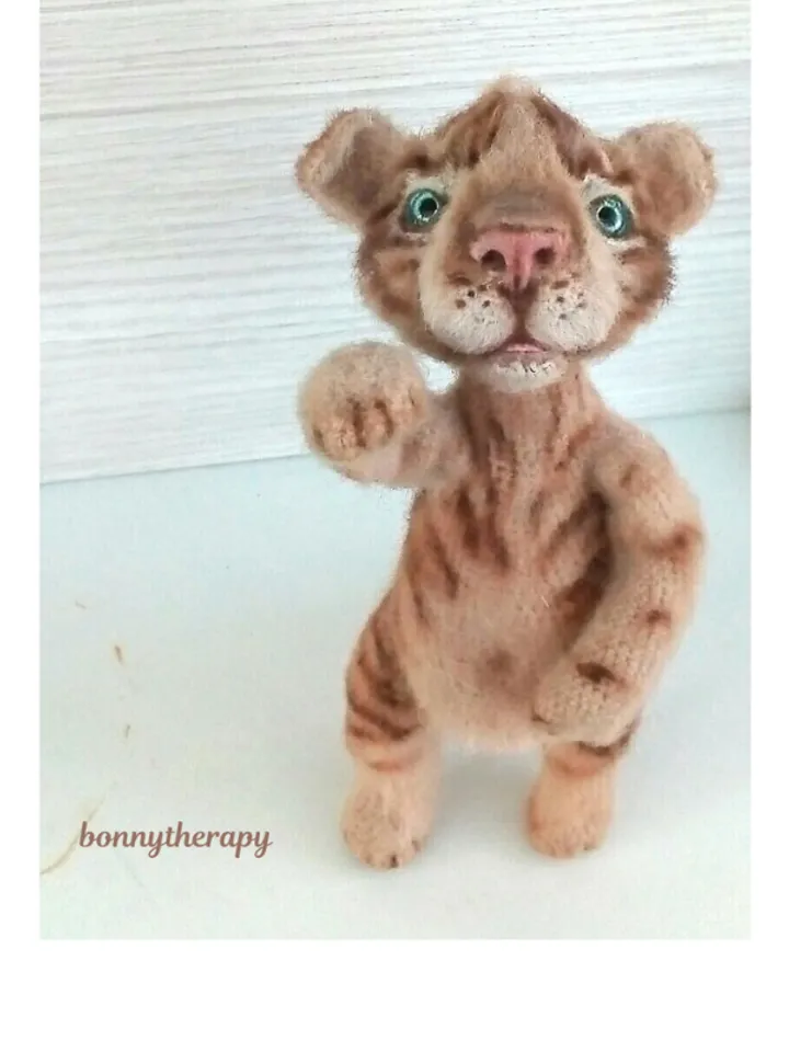 Cute crochet toy tiger cub, stuffed animal with wire frame