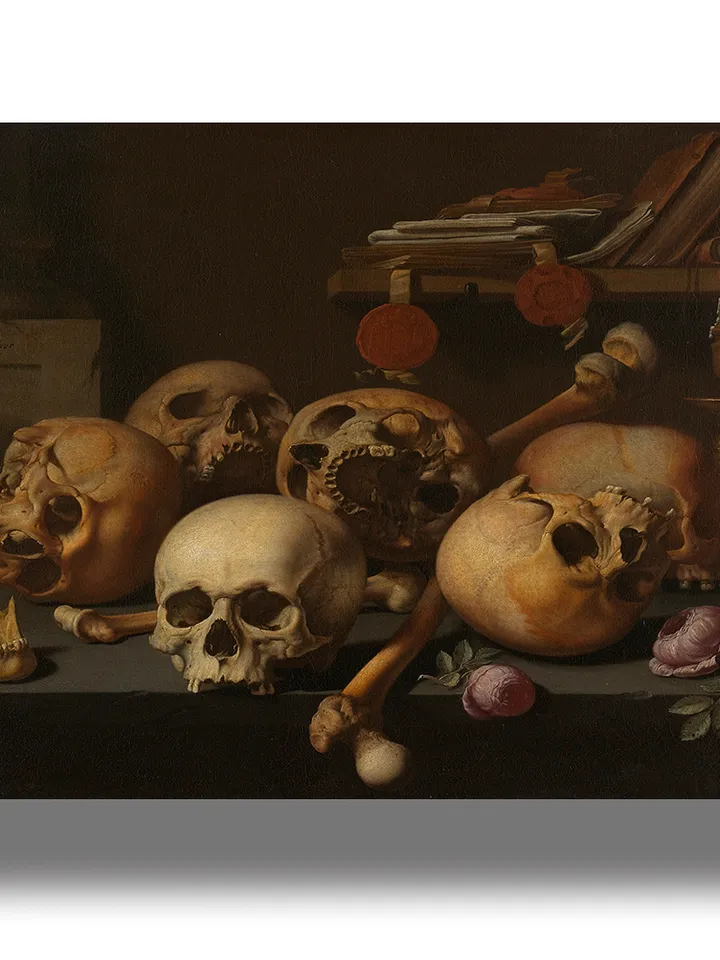 Vanitas still life with many skulls.