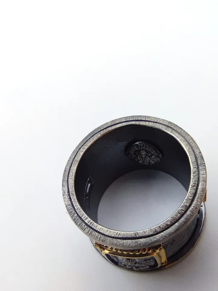 Gorgeous ring with faces of saints