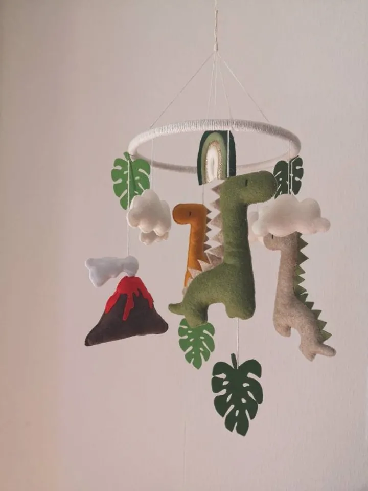 Dinosaur crib baby mobile with rainbow cloud star monstera. Baby shower gift ide