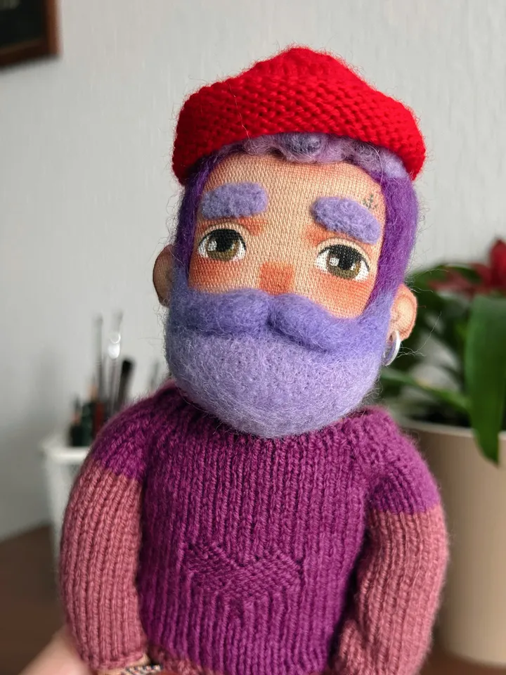 Textile doll sailor with purple beard