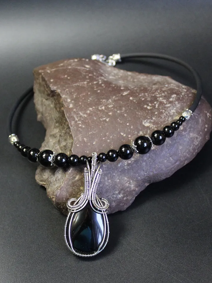 Handmade necklace made of natural stones. Wire wrapped stone pendant.