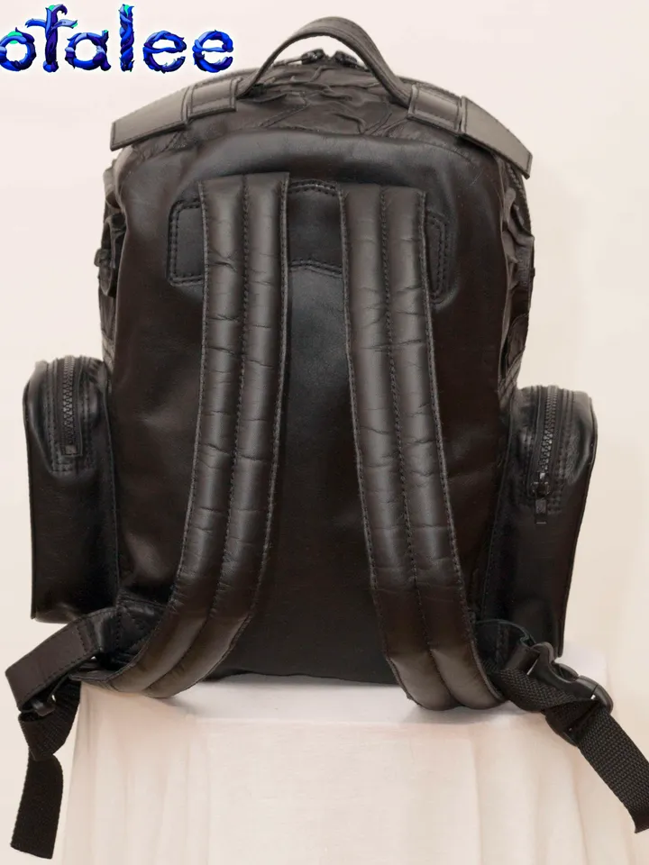 Backpack of genuine leather black color, 3D details modern style. Outdoor Casual Backpack.