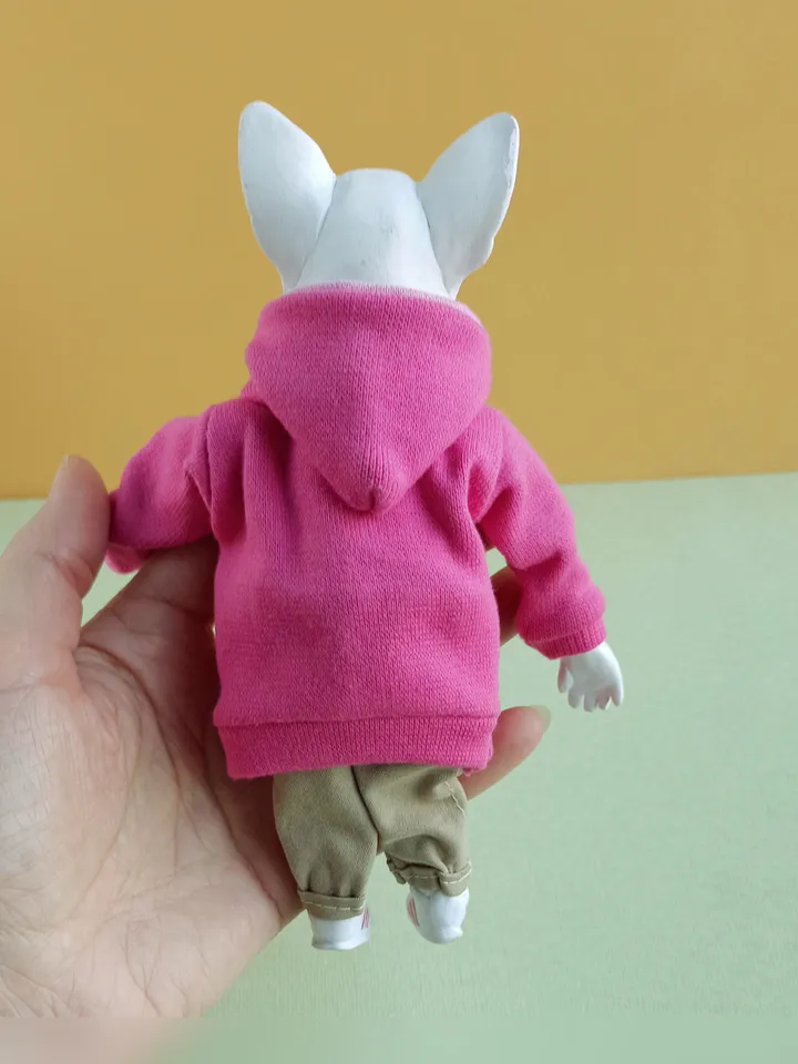Bull Terrier doll in a pink sweater