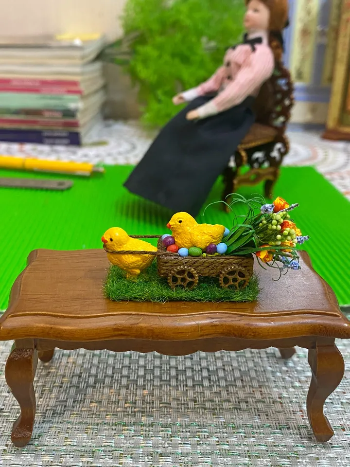 Easter miniature. Two chickens with a cart and a bouquet of flowers.1:12