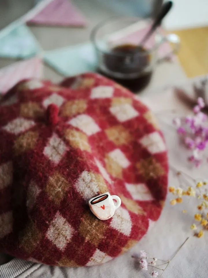 Warm brooch made of polymer clay, mug pin
