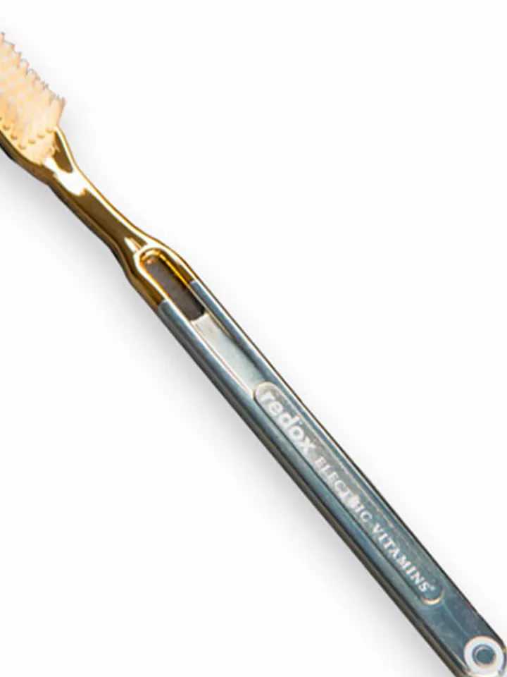 Redox toothbrush with electric vitamins 100 uA