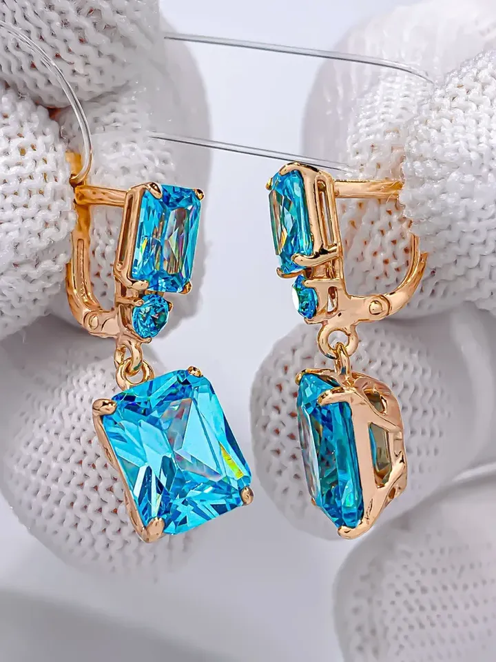 Earrings jewelry Silver gold plated 925 assay value with topaz, cubic zirconia blue