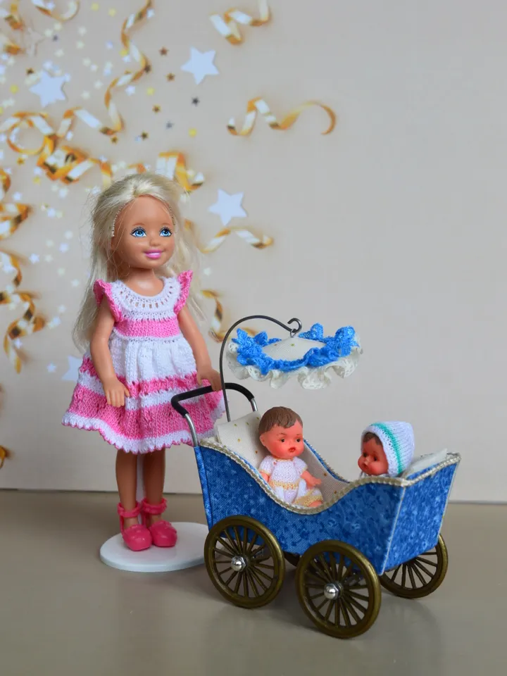 Miniature toy stroller for two small dolls. Handmade miniature stroller for small dolls.