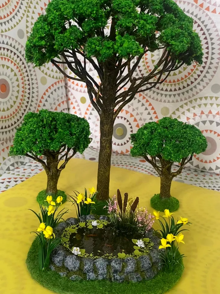 Miniature pond with goldfish. Dollhouse miniature. 1:12. Handmade pond. Pond with irises and fish.