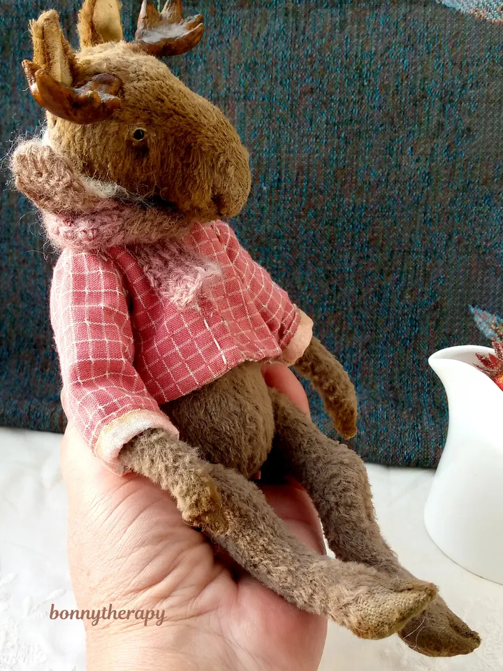 Teddy moose, cuddly plush elk in teddy style 6.6 inches sitting.