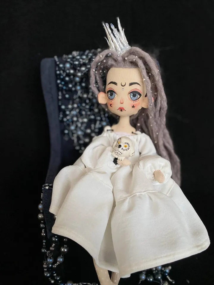 White Queen doll with dreadlocks and tattoos